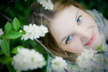 beautiful girl in spring garden