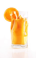 Fresh orange drink with slices of fruits