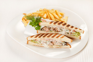 Sandwiches with French fried potatoes