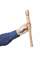 Arm of a man in blue shirt sleeve holding block flute on white