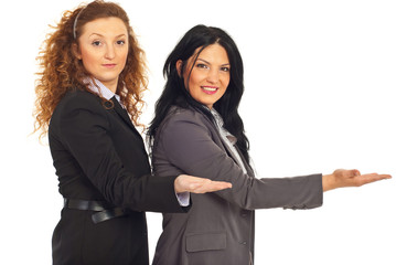 Business women welcoming