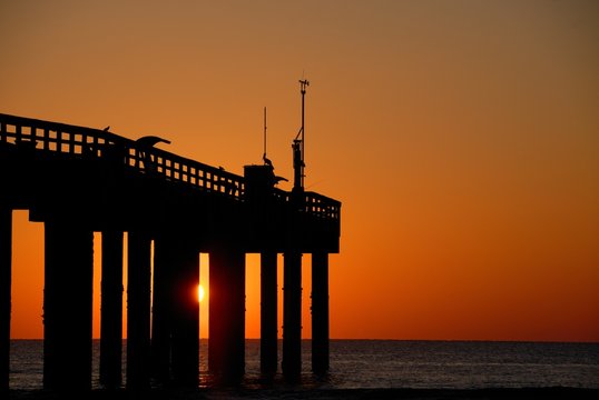 fishing pier at sunrise st augustine beach florida usa