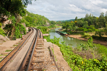 Fototapeta premium Railway beside mountain
