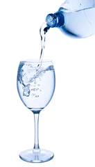 Poster Im Rahmen pouring water into glass © kubais