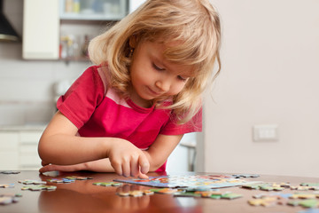 Girl, playing puzzles