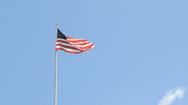 American Flag with Airplane overhead