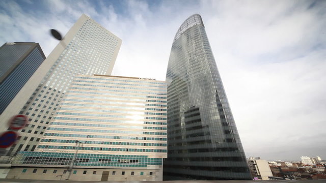 high-rise building on street of modern city