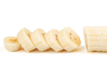 Sliced bananas on a white background