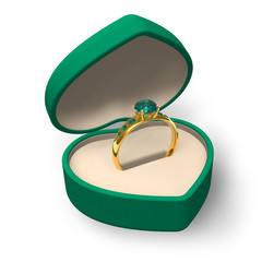 Green heart-shape box with golden ring with jewels