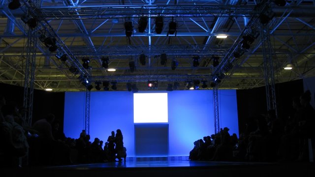 People wait for  fashion show