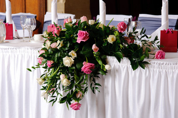 Head table at wedding reception decorated