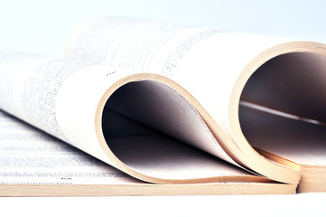 Close up to open book isolated on white background.