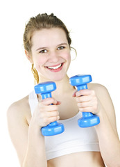 Fit active girl exercising with weights