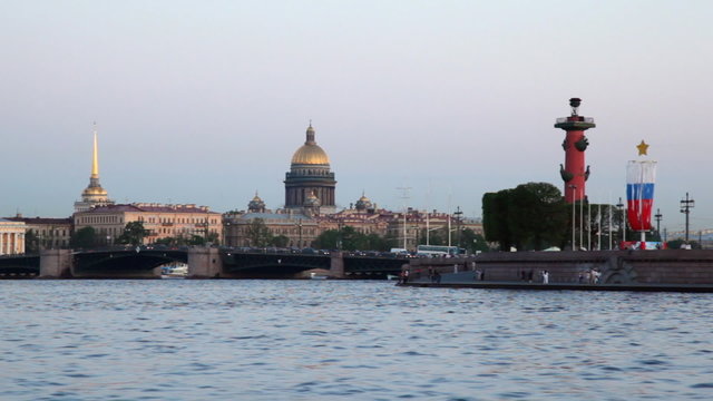 Basil Island in St. Petersburg spring day, river floats boat
