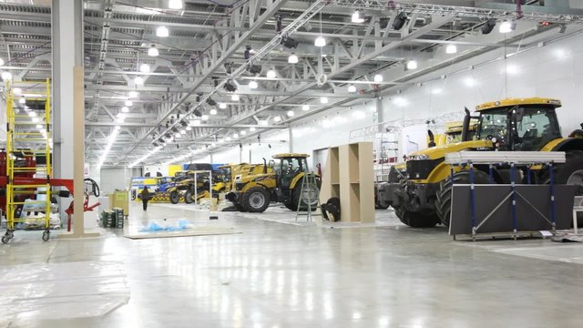 Agricultural machinery in empty hall