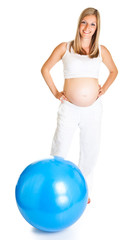 Pregnant woman excercises with gymnastic ball