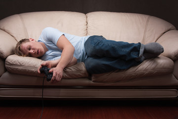 sleepy gamer © Sanzhar Murzin