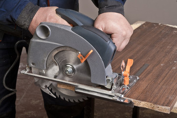 Carpenter with circular saw