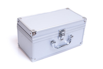 Silvery suitcase on a white background