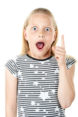 Surprised little girl pointing with finger