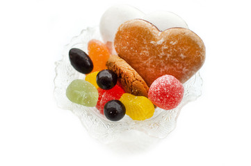 Sweets in a vase. Isolated on white background