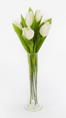 Artificial tulips in a vase