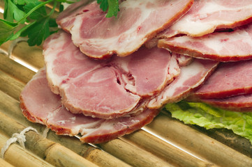 Beautiful sliced food arrangement of meat.