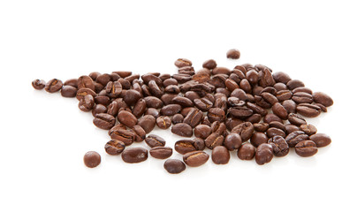 Pile of  roasted coffee beans over white background