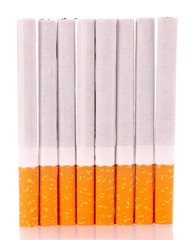 Many cigarettes isolated on white