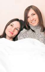 Smiling daughter with her mother