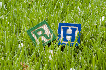 Rh letters on the grass