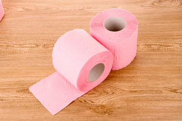 Toilet paper on wooden table