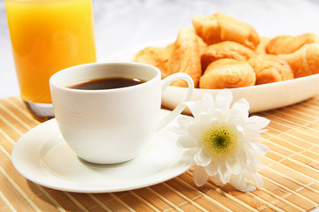 Breakfast coffee and croissants