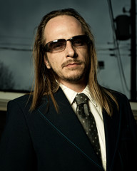 Man in Retro Suit Wearing Sunglasses