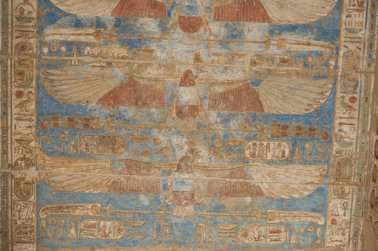 Egyptian hieroglyphics on a temple wall