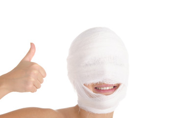 Satisfied woman with bandaged head