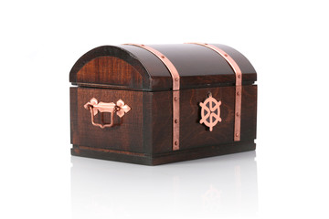 Closed wooden chest with reflection