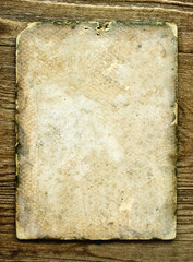 old paper on brown wood texture with natural patterns