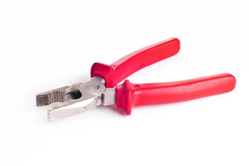 red metallic pliers isolated