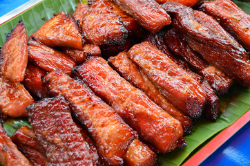 Grilled pork on green leaf