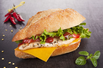 Sandwich with grilled chicken. Chicken sandwich.