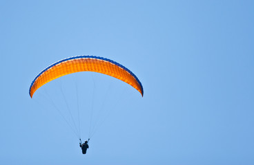 parachuter in sky