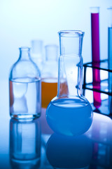 Laboratory glassware containing colorful liquid