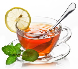 Cup tea with mint isolated on a white background.