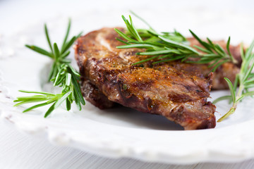 Grilled pork with fresh rosemary