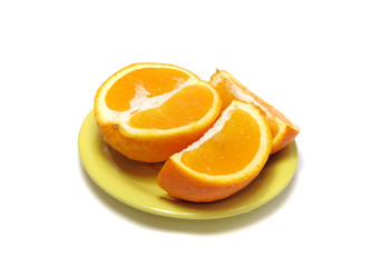 Fototapeta na wymiar Orange on a plate