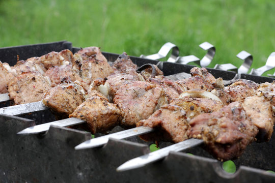 Juicy pork shashlick is prepared on Barbecue