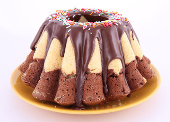 Bundt Cake, covered with chocolate and sprinkles