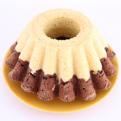 Bundt Cake, freshly baked, on white background