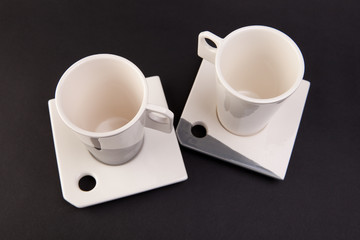 cups on dark gray background
